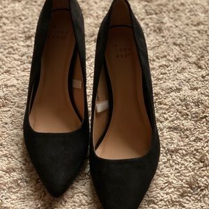 Black suede pumps
